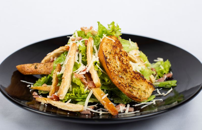 Caesar salad side at Marcos restaurant