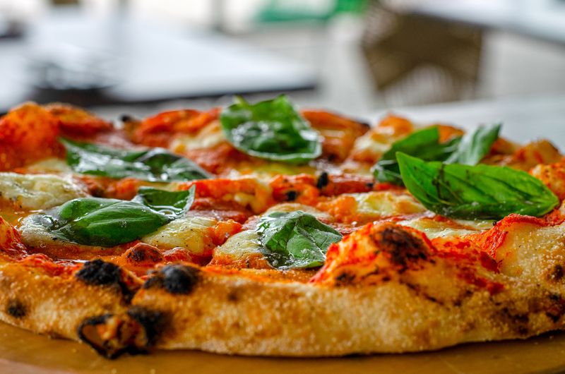 Classic Margherita marco's pizza with fresh basil and mozzarella